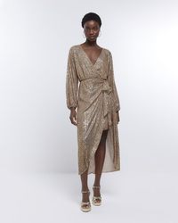 River Island - Gold Sequin Long Sleeve Wrap Dress - Lyst