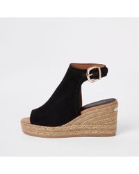 black wedge trainers river island