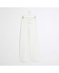 River Island - Textured Wide Leg Trousers - Lyst