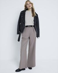 River Island - Beige Belted Wide Leg Trousers - Lyst