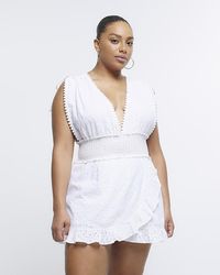 River Island - Plunge Broderie Playsuit - Lyst