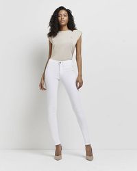 River Island - Molly Mid Rise Super Skinny Jeans - Lyst