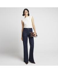 River Island - Front Pocket High Waisted Wide Leg Jeans - Lyst