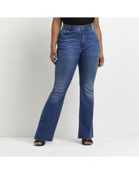 River Island - Plus Blue Mid Rise Flared Jeans - Lyst