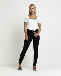 River Island - Molly Mid Rise Skinny Jeans - Lyst