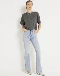 River Island - Blue High Waisted Flared Jeans - Lyst