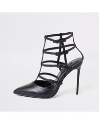 river island black and gold heels