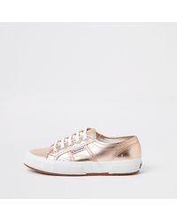 white and rose gold trainers