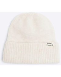 River Island - Cream Fluffy Beanie Hat - Lyst