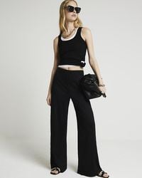River Island - Black Ribbed Wide Leg Trousers - Lyst