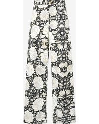 Roberto Cavalli - Pants With All-Over Floral Print - Lyst