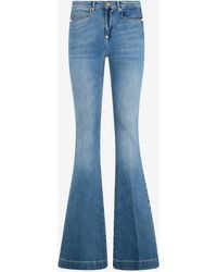 Roberto Cavalli - Flared Jeans With Monogram Rc - Lyst