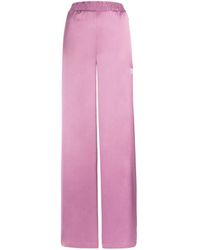 Slacks and Chinos Leggings Roberto Cavalli Synthetic Logo-jacquard leggings in Pink Womens Clothing Trousers 