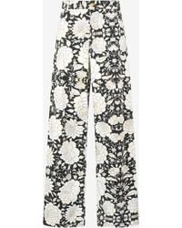 Roberto Cavalli - Pants With All-Over Floral Print - Lyst