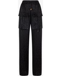 Roberto Cavalli - Pants With Solid-Color Jaguar Skin Print - Lyst
