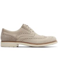 rockport total motion wingtip