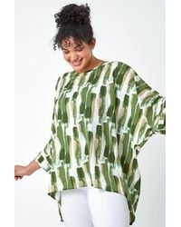 Roman Curve - Dipped Hem Abstract Print Top - Lyst