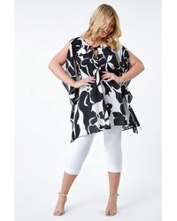 Roman Curve - Abstract Twist Detail Keyhole Top - Lyst
