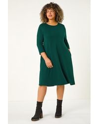 Roman Curve - Pocket Detail Swing Stretch Dress - Lyst