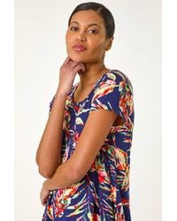 Roman - Leaf Print Hanky Hem Tunic Stretch Top - Lyst