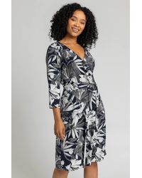 Roman Petite - Floral Lily Print Belted Wrap Dress - Lyst