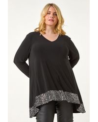 Roman Curve - Sequin Hem Stretch Top - Lyst