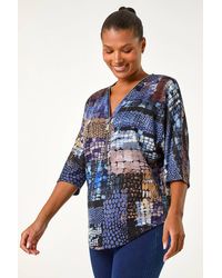 Roman - Abstract Print Front Zip Stretch Top - Lyst