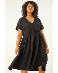 Roman Curve - Textured V-Neck Stretch Dress - Lyst