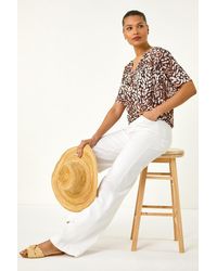Roman - Abstract Print V-Neck Stretch Top - Lyst
