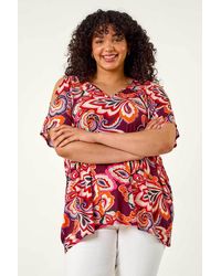 Roman Curve - Floral Print Cold Shoulder Top - Lyst