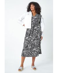 Roman Curve - Linear Print Midi Wrap Dress - Lyst