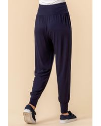 Roman - Jersey Stretch Harem Trousers - Lyst