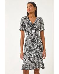 Roman - Stretch Leaf Print Side Button Dress - Lyst