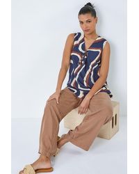 Roman - Sleeveless V-Neck Swirl Print Pleat Front Top - Lyst