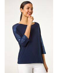 Roman - Sequin Sleeve Panel Stretch Top - Lyst