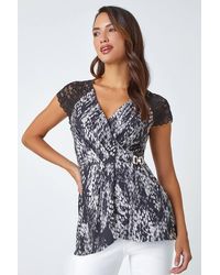 Roman - Abstract Lace Trim Stretch Wrap Top - Lyst