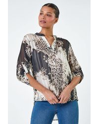 Lilly-and-Hope - V-Neck Animal Print Shimmer Stripe Top - Lyst
