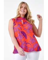 Roman Curve - Floral Bubble Hem Keyhole Top - Lyst