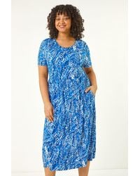 Roman Curve - Spot Print Stretch Dress - Lyst