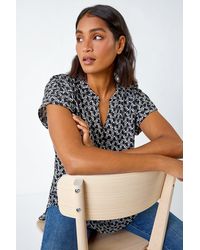 Roman - Abstract Print Woven Pleat Front V-Neck Top - Lyst