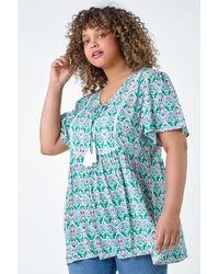 Roman Curve - Tie Front V-Neck Boho Printed Top - Lyst