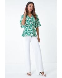 Lilly-and-Hope - Floral Print V-Neck Wrap Tie Top - Lyst