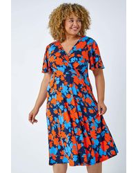 Roman Curve - Floral Print Midi Wrap Dress - Lyst