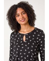 Roman - Bow Print Cutout Tunic Top - Lyst