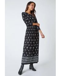 Roman - Floral Border Print Maxi Stretch Dress - Lyst