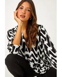 Roman - Geometric Print V-Neck Stretch Blouse - Lyst