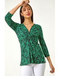Roman - Leaf Print V-Neck Twist Front Top - Lyst
