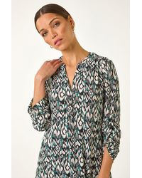 Roman - Aztec Print V-Neck Stretch Blouse - Lyst