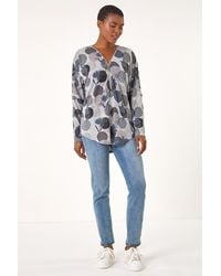 Roman - Spot Print V-Neck Zip Front Stretch Top - Lyst