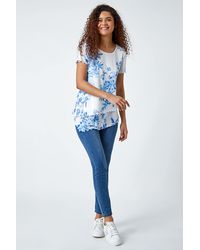 Roman - Floral Print Asymmetric Hem Top - Lyst